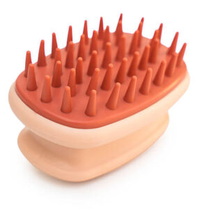 New head massager on white isolated background
