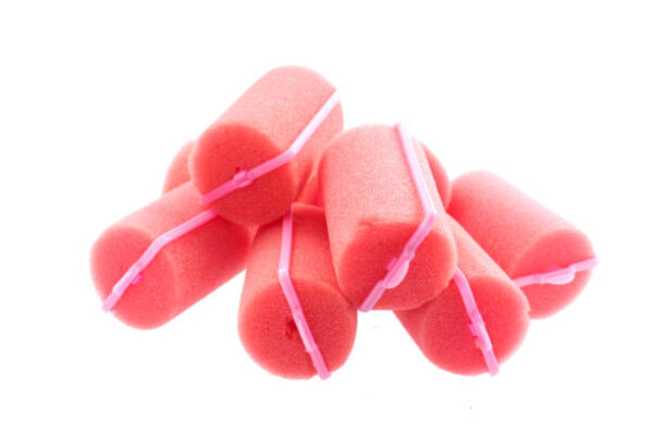 Make up colored sponges curling clip on a white background